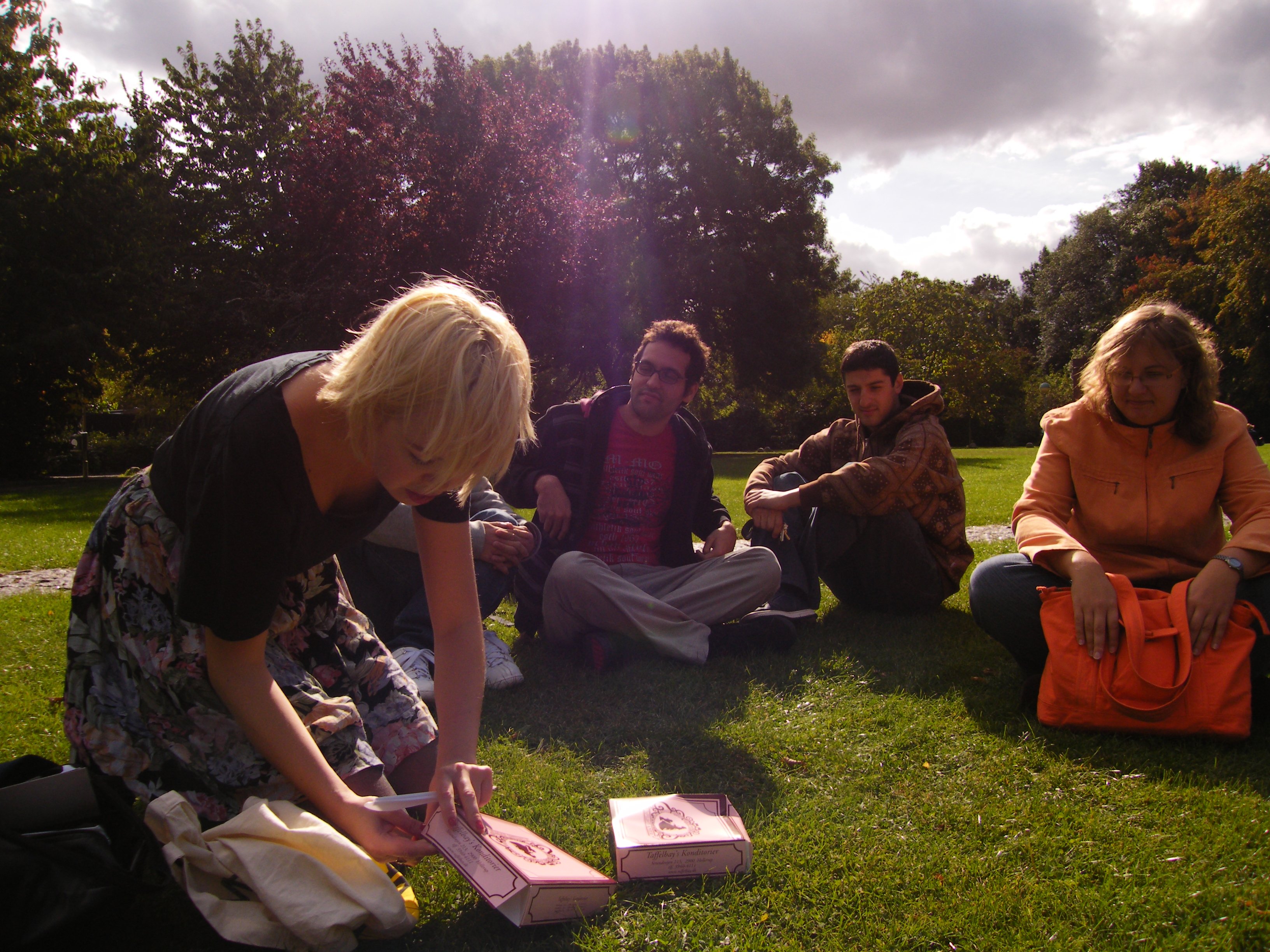 University Post reporter brings cake to the contest winners 