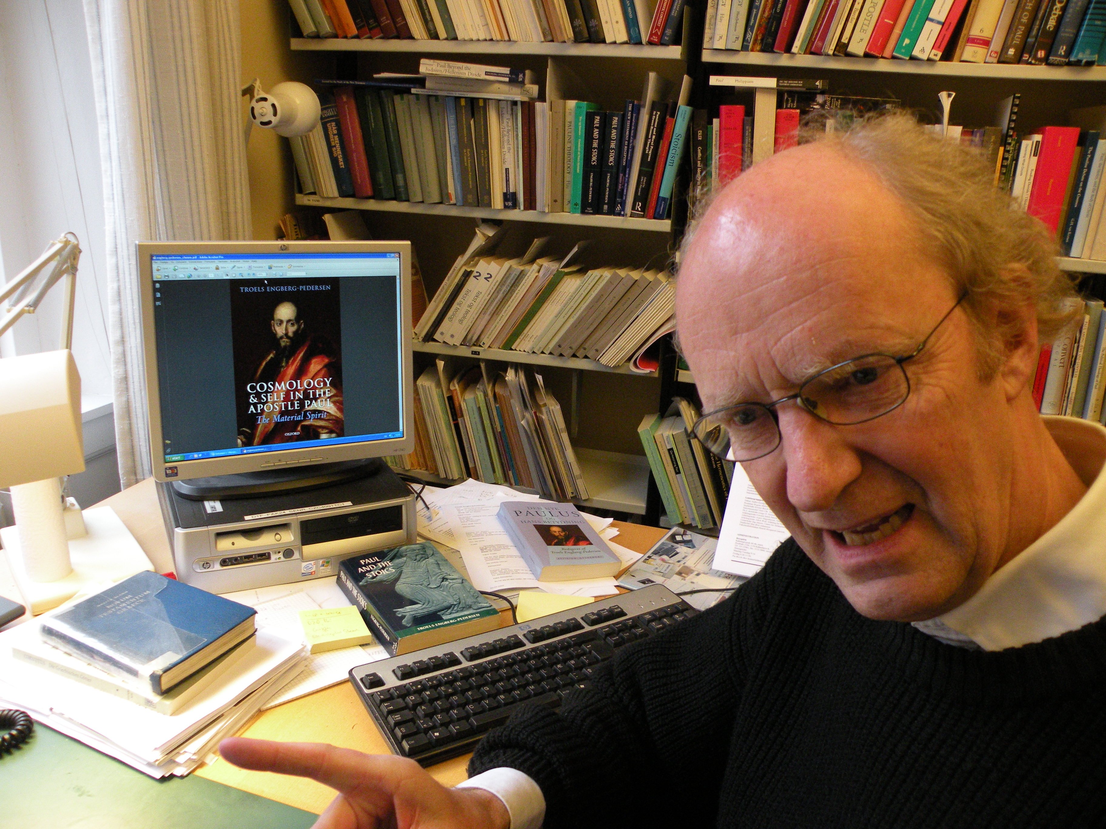 EXEGESIS - In front of a screen shot of his upcoming book. The picture of Paul on the front cover is by El Greco, Troels explains