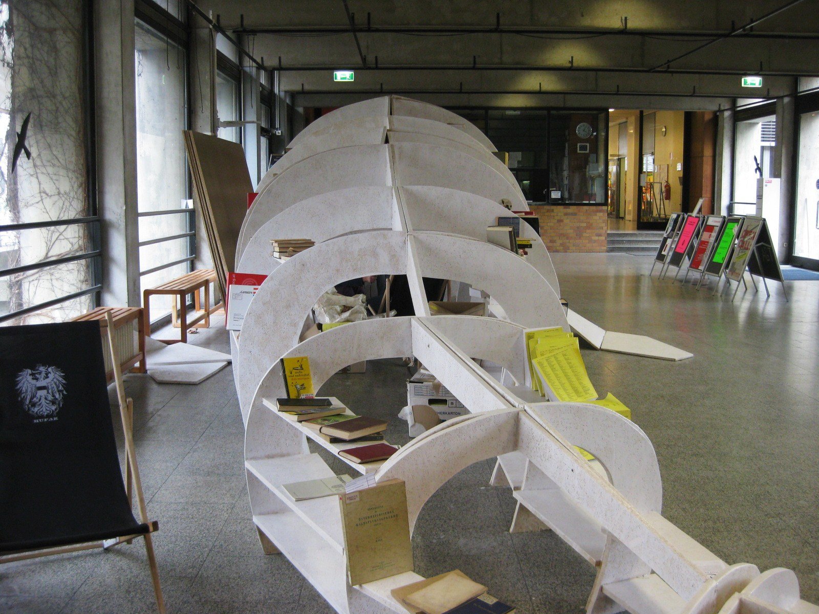 Books, symbols of knowledge, to be added to make the whale more solid