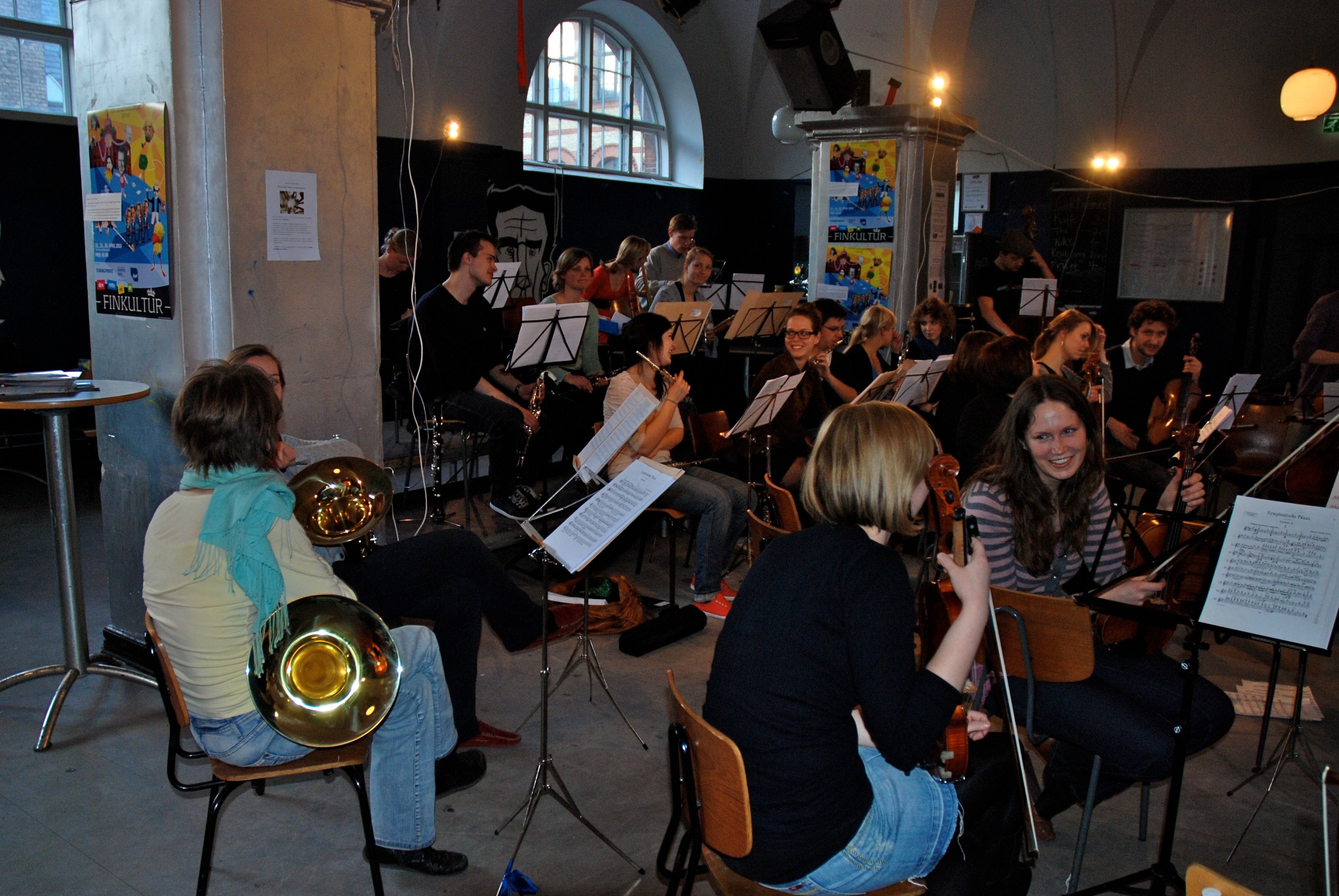 The university orchestra, SymphUni, is warming up for an important concert in May