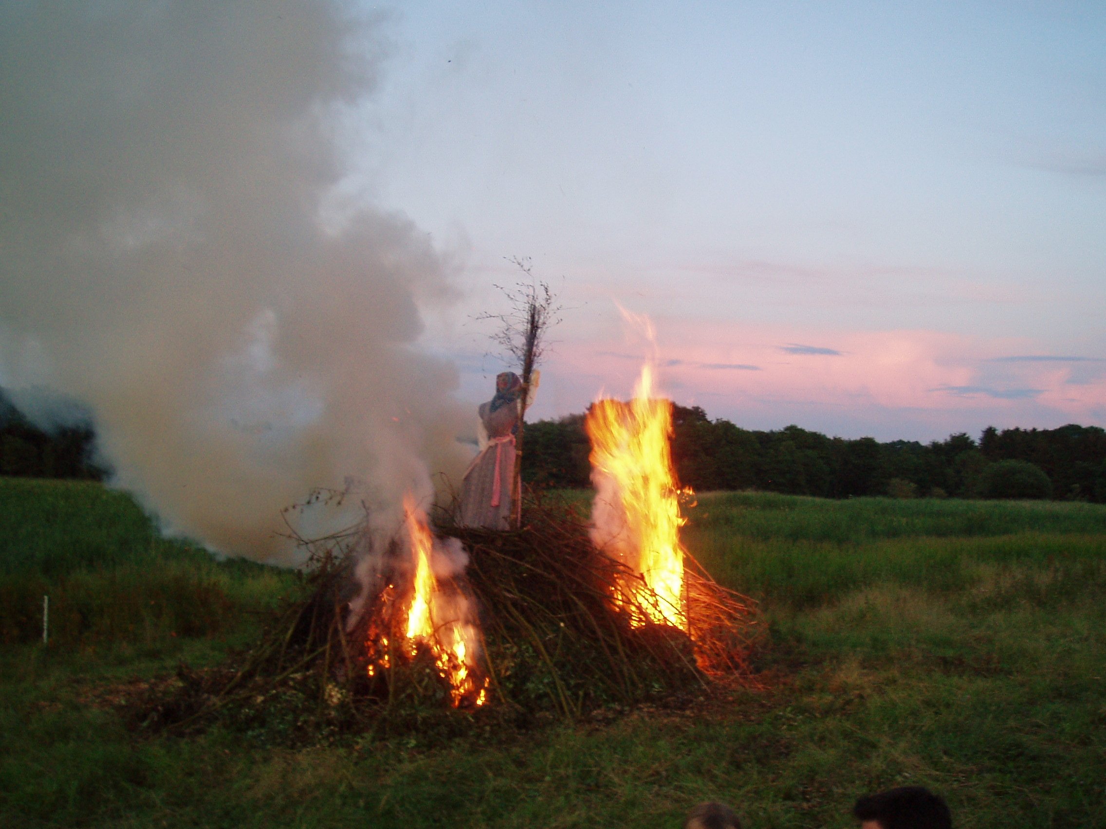 St. Hans bonfire and witch effigy. Come along to the big sing along