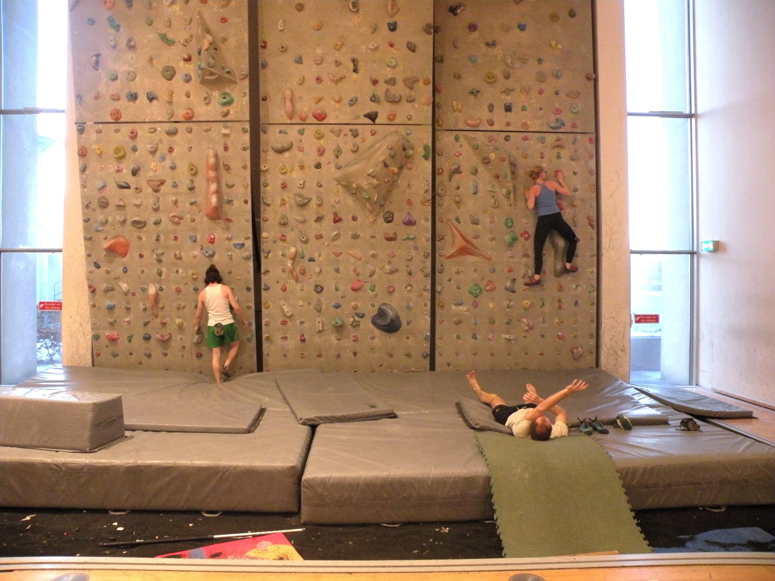 Boulderers often try to exercise their hands in the air before approaching the wall
