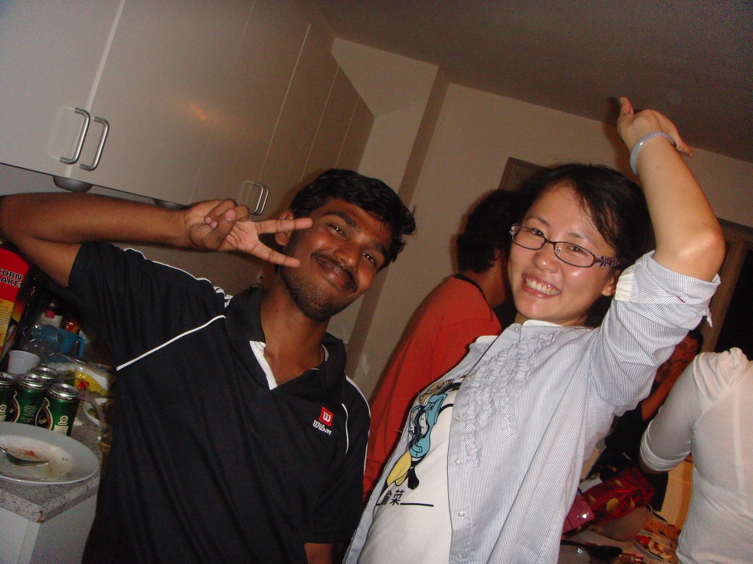 Indian student Raju and Jiao, from China, at an international party 