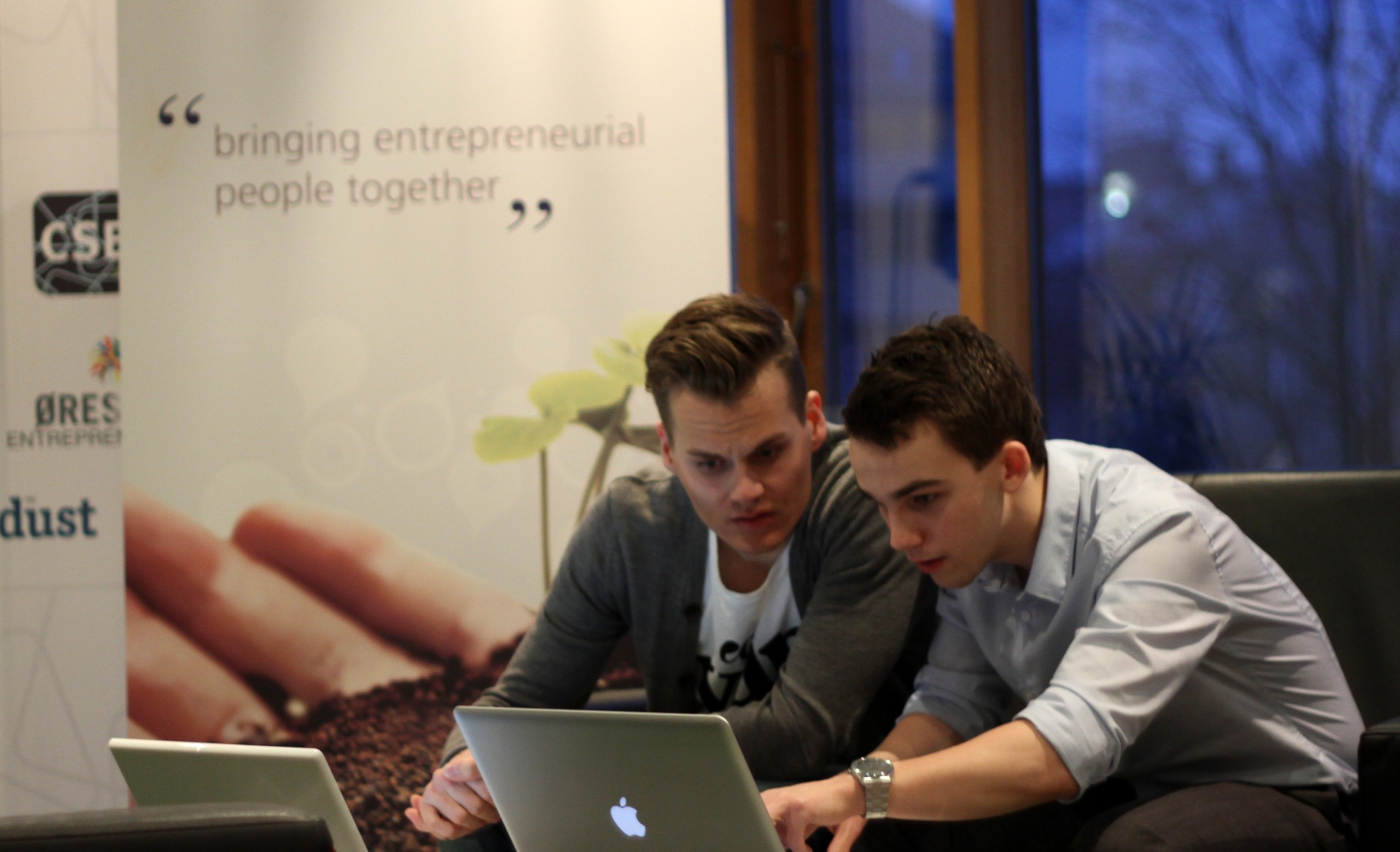 Organizers Jesper Klingenberg and Dan Nielsen at work getting hold of their keynote speakers