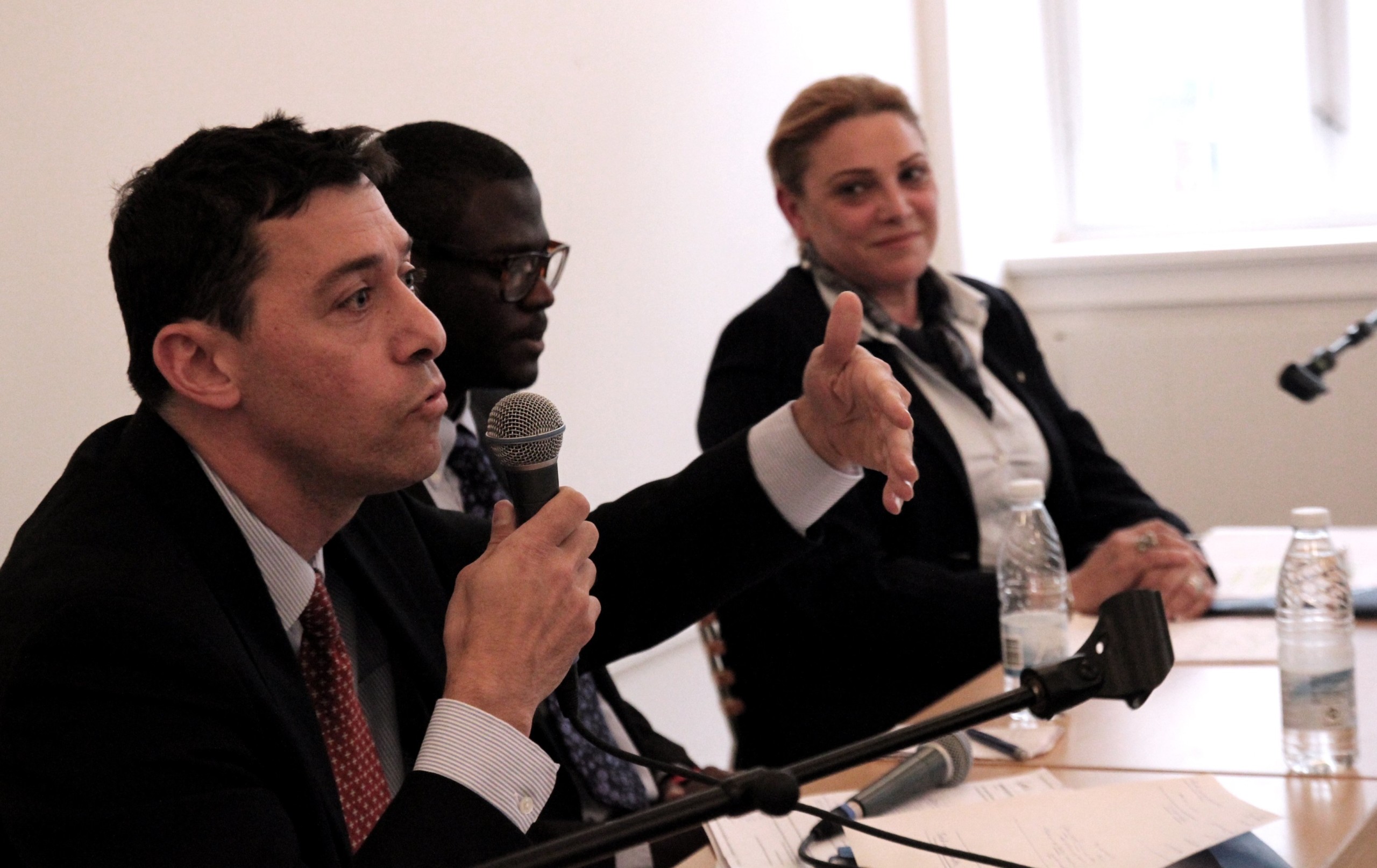 Israeli and Palestinian representatives flank Gregory Rockson, of the Copenhagen Union, at the Studenterhuset Wednesday