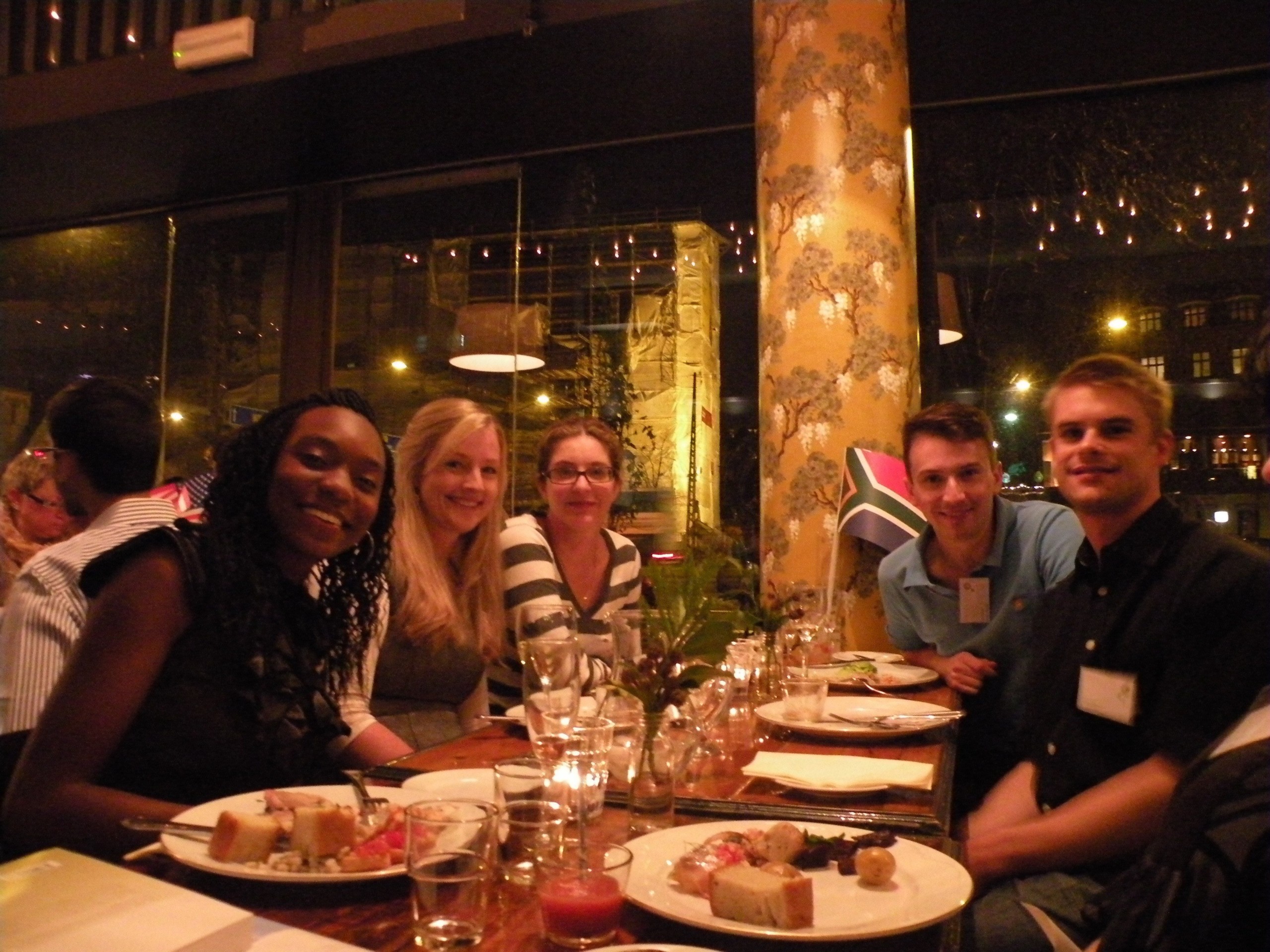Cape Town's table at the welcoming dinner Monday night. For them, this year's theme, 'Access to Food' is closer to home, they say