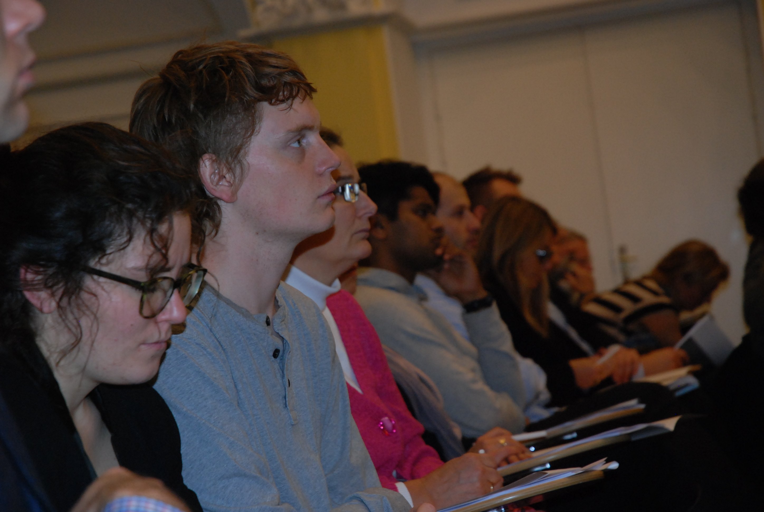 Serious faces in the audience