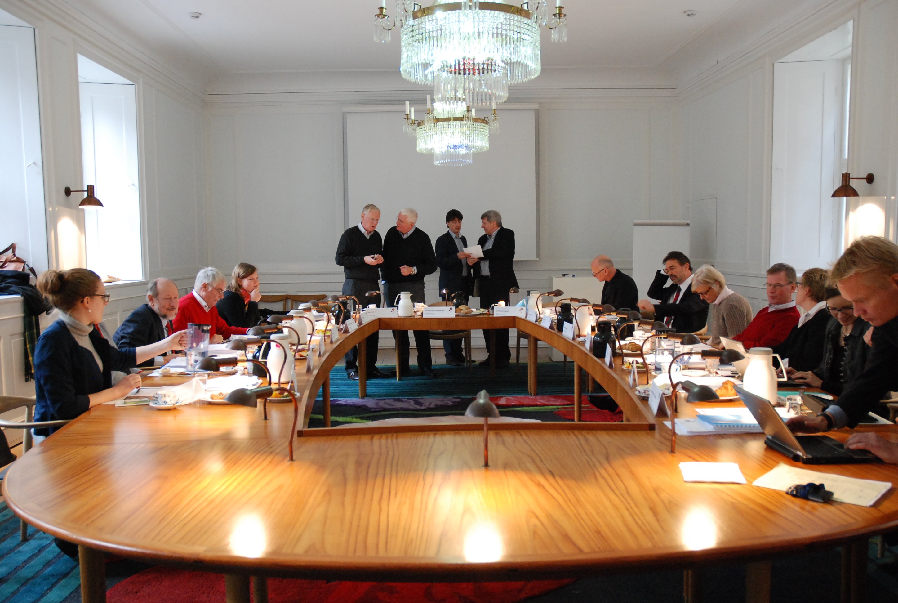 Members of University management having a last prep talk before the faculty merger agenda point at the Board meeting