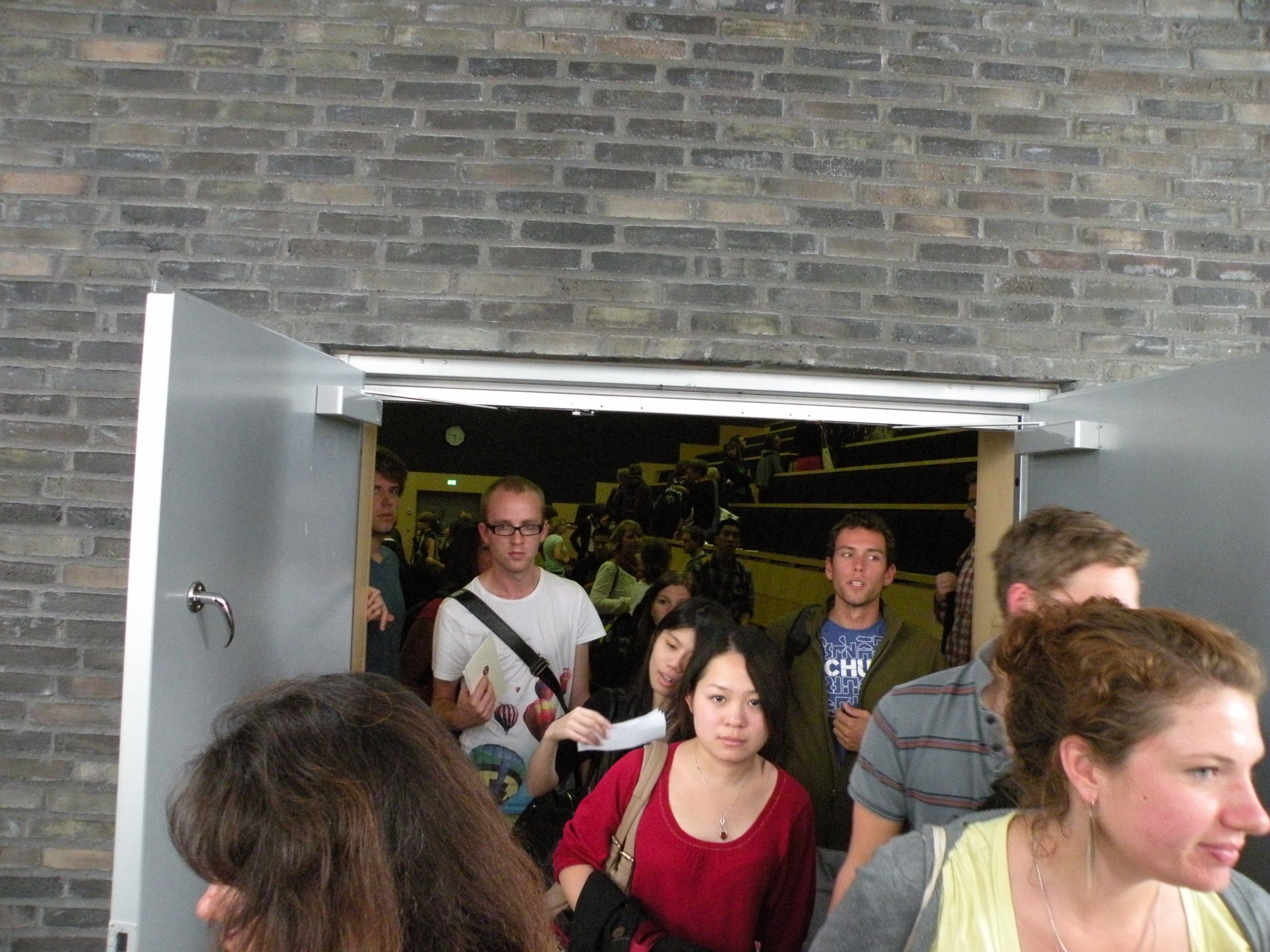 New exchange students chat before an orientation meeting. For housing, exchange students do alot better than those that stay for a full degree