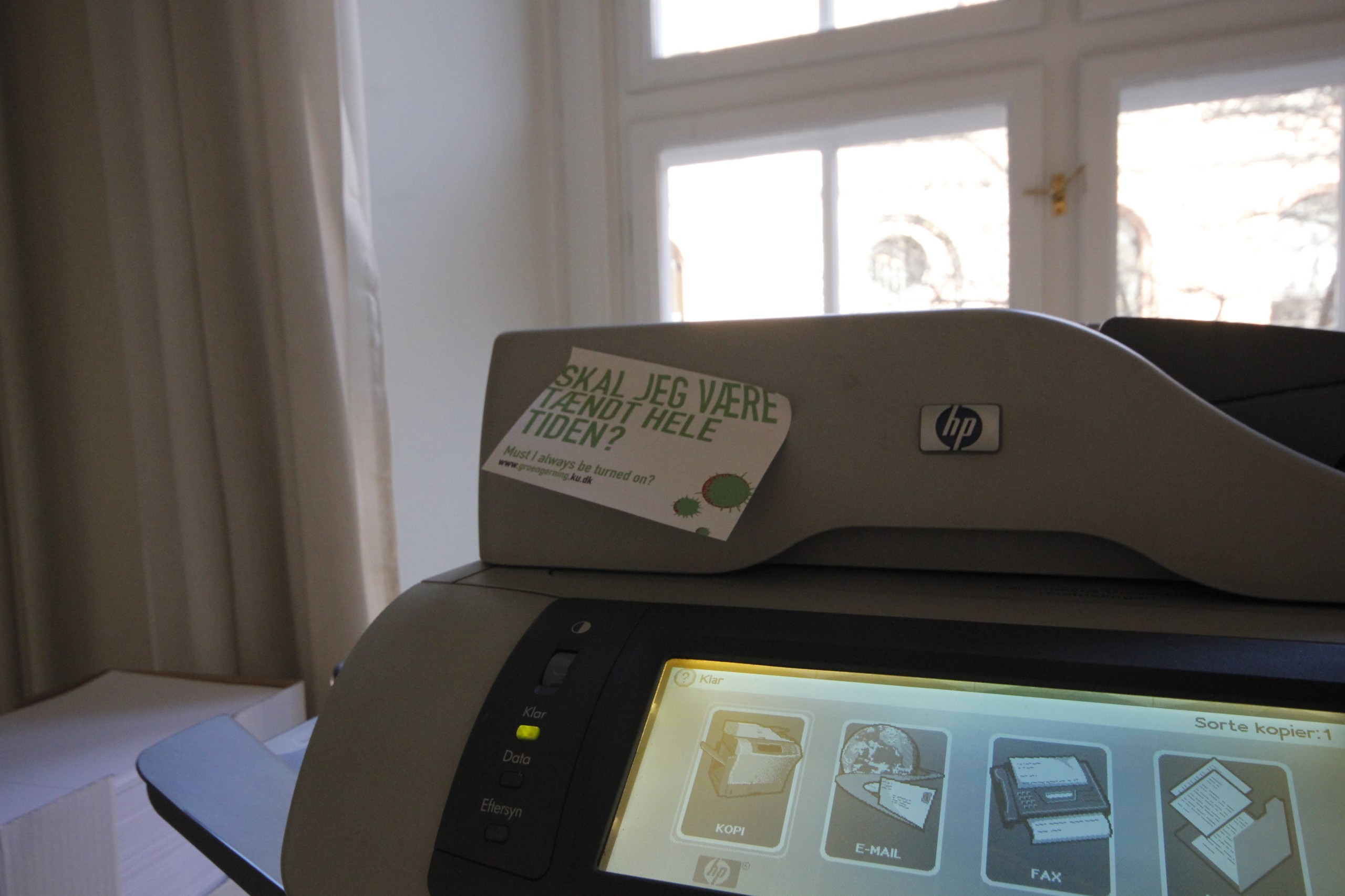 Sticky notes on campus printers is one of the ways the green action plan is trying to make people think about their energy usage