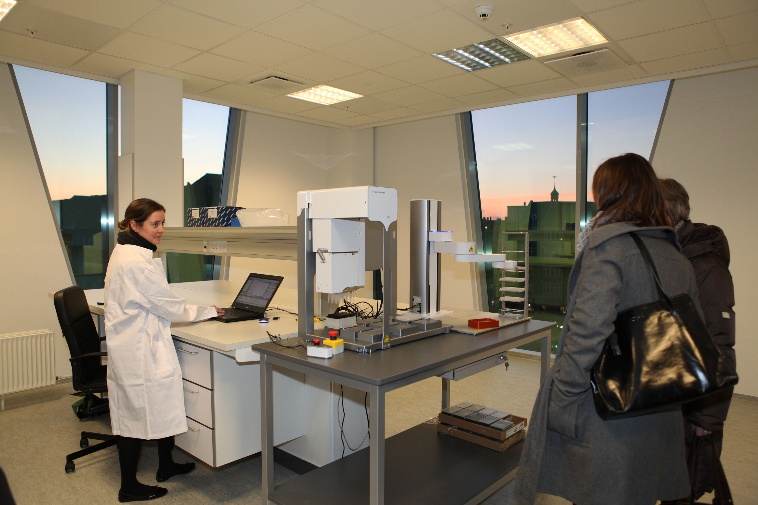 Guests are shown part of the new research lab.