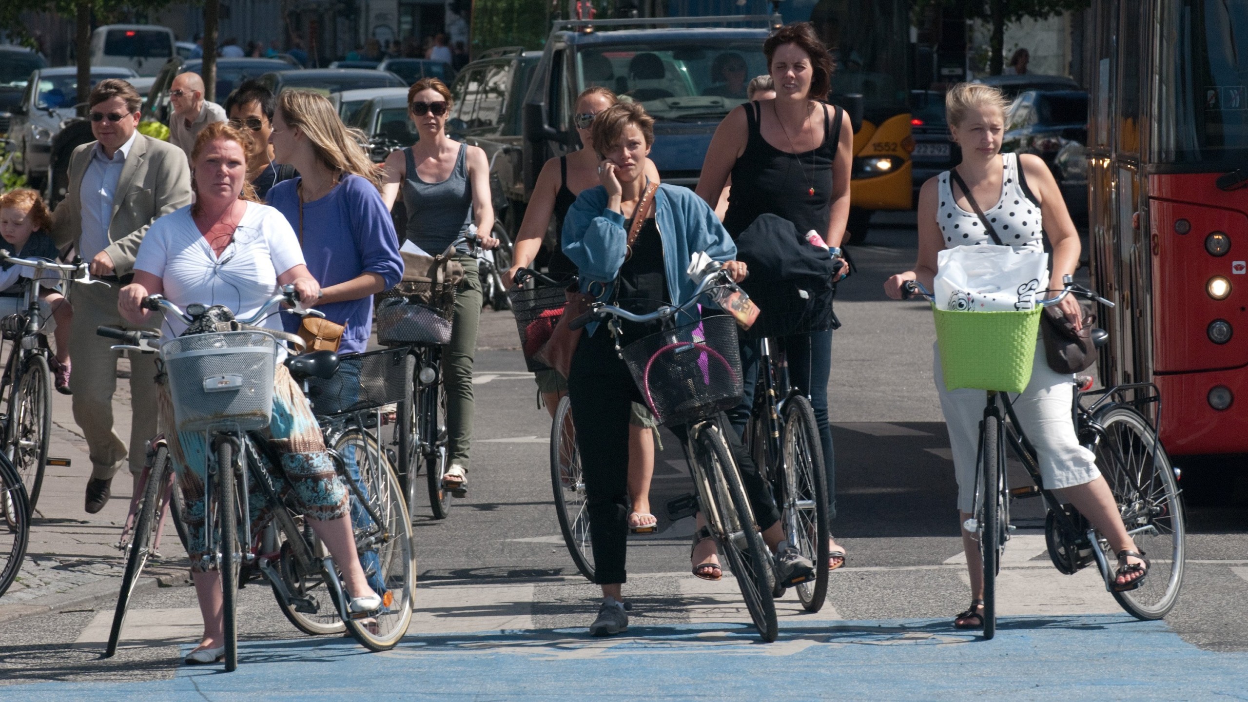Cyclists waiting for the light to change in Copenhagen