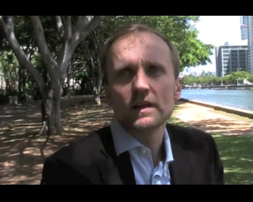 Fuzzy screenshot of Professor Timo Kivimäki talking about eastern Asia in an interview before being charged under section 108 of the Danish Penal Code