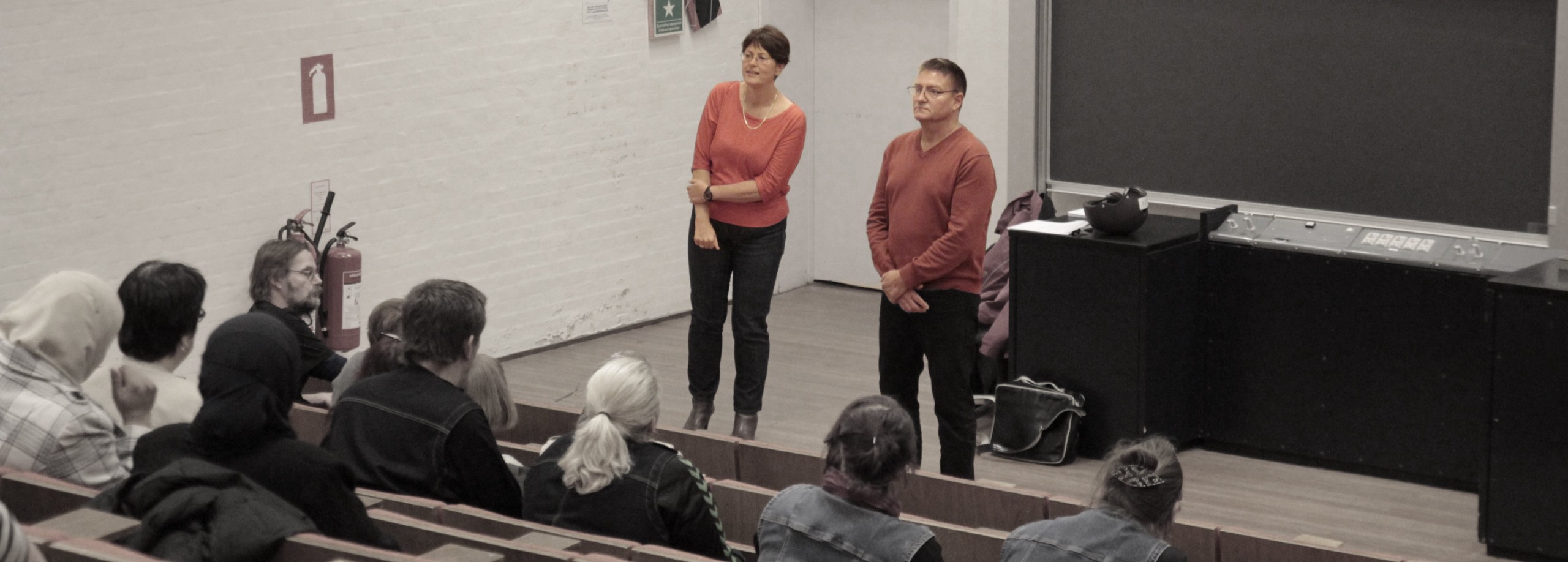 Cleaning manager Lis Møller next to service manager Kell Matthies at the Cleaning Service meeting. The man on the first row to the left is staff representative Søren Møller.