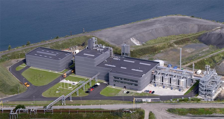 UNIVERSITETSINDUSTRI? - Debattør Knud Haugmark anklager KU-forskere, der har modtaget forskningsmidler fra DONG, for at pleje selskabets dagsorden: At udarbejde et regnestykke, som kan bruges i kampen for at rejse penge til store og dyre bioraffinaderier som Incibon-værket ved Kalundborg.  