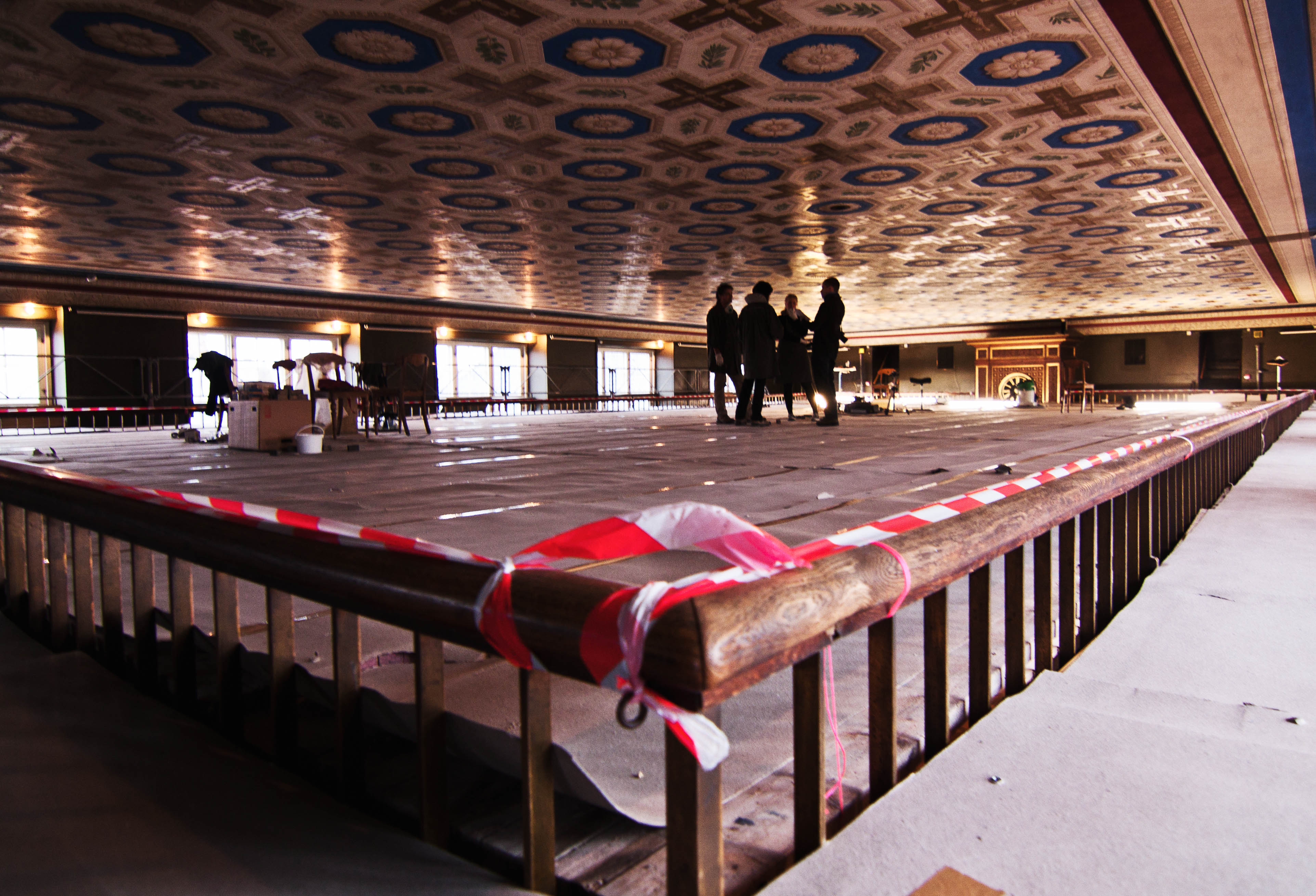 Luckily for the reporters, the platforms completely obscured the hundred-foot drop to the floor