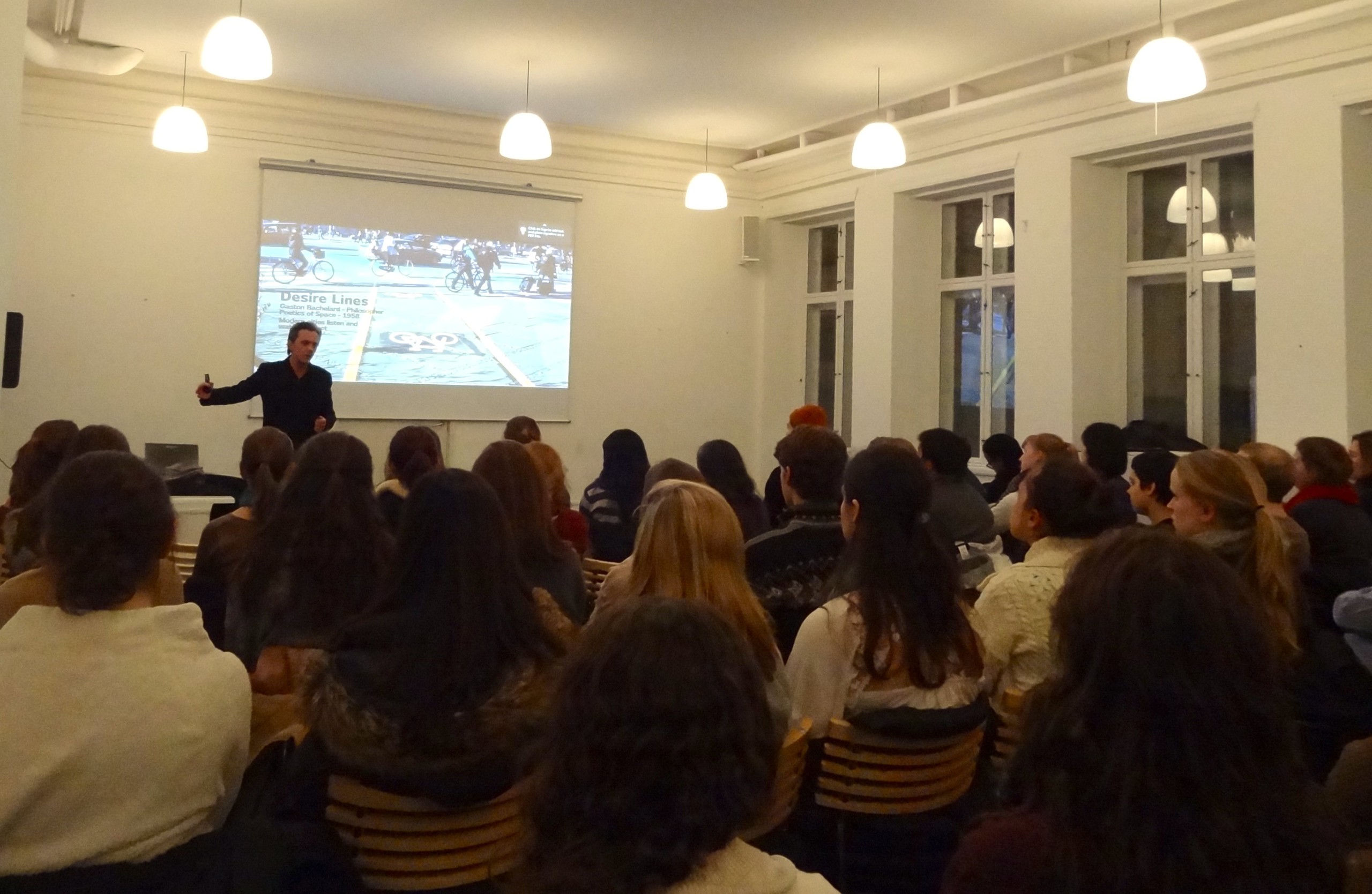 Mikael discussing Copenhagen cycling culture to eager Americans