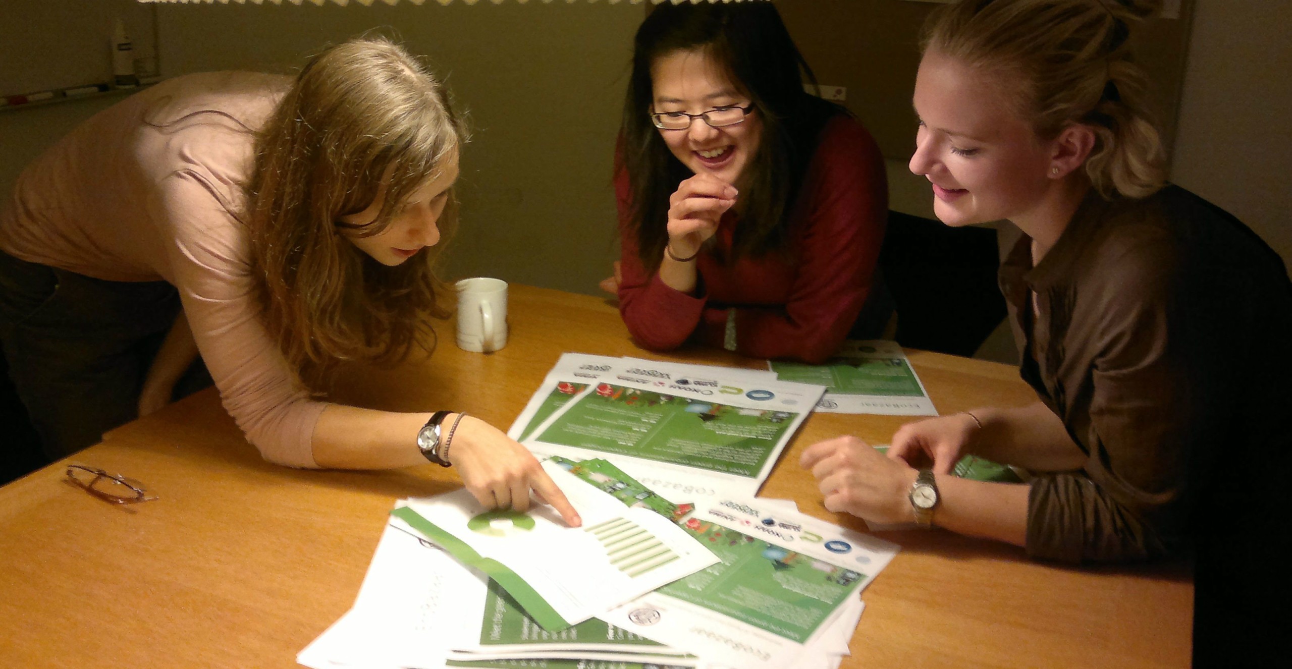 Student volunteers Susi Konrad, Annie Cao and Caroline Drost Jensen planning the EcoBazaar taking place November 20th  