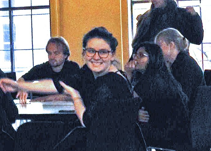 Winning candidate smiles to the University Post reporter's mobile phone at the announcement ceremony