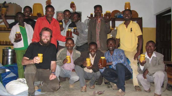 Carlo (front left) with members of Chicho Hayo’s beekeepers’ cooperative. Their new techniques open them up to another sector of the honey market, boosting incomes and propelling their business toward self-sustainability
