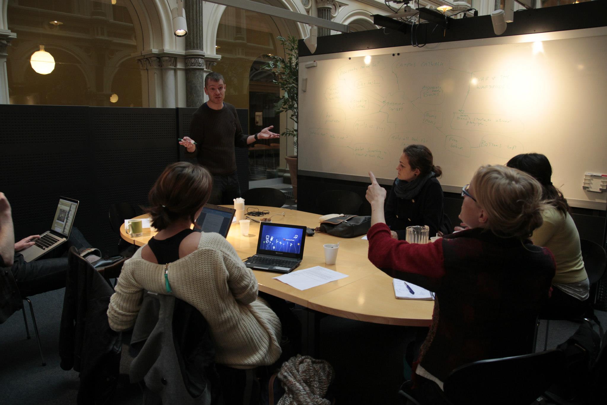 From one of the University Post's bi-weekly editorial meetings. This one was held in the museum building on Central Campus