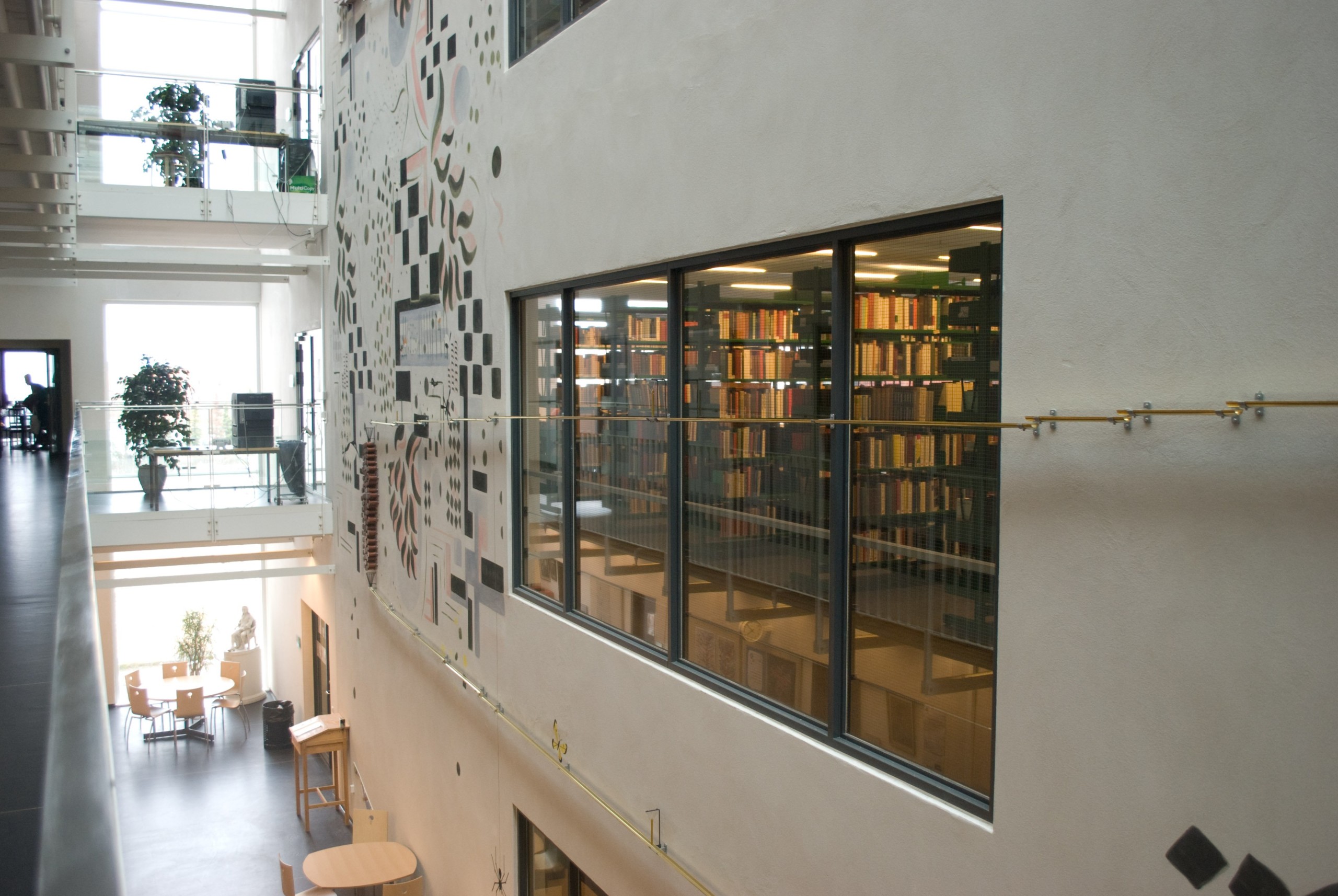 The new artwork at INSS has balls rolling down a slide