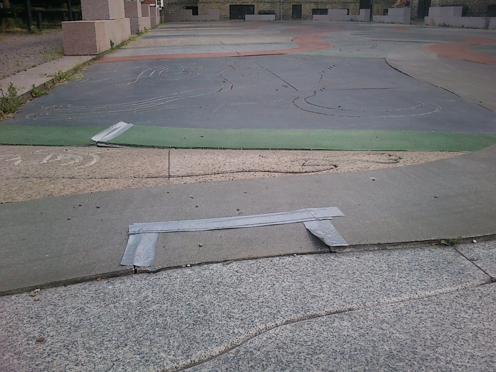 Ground mural now held together by duct tape