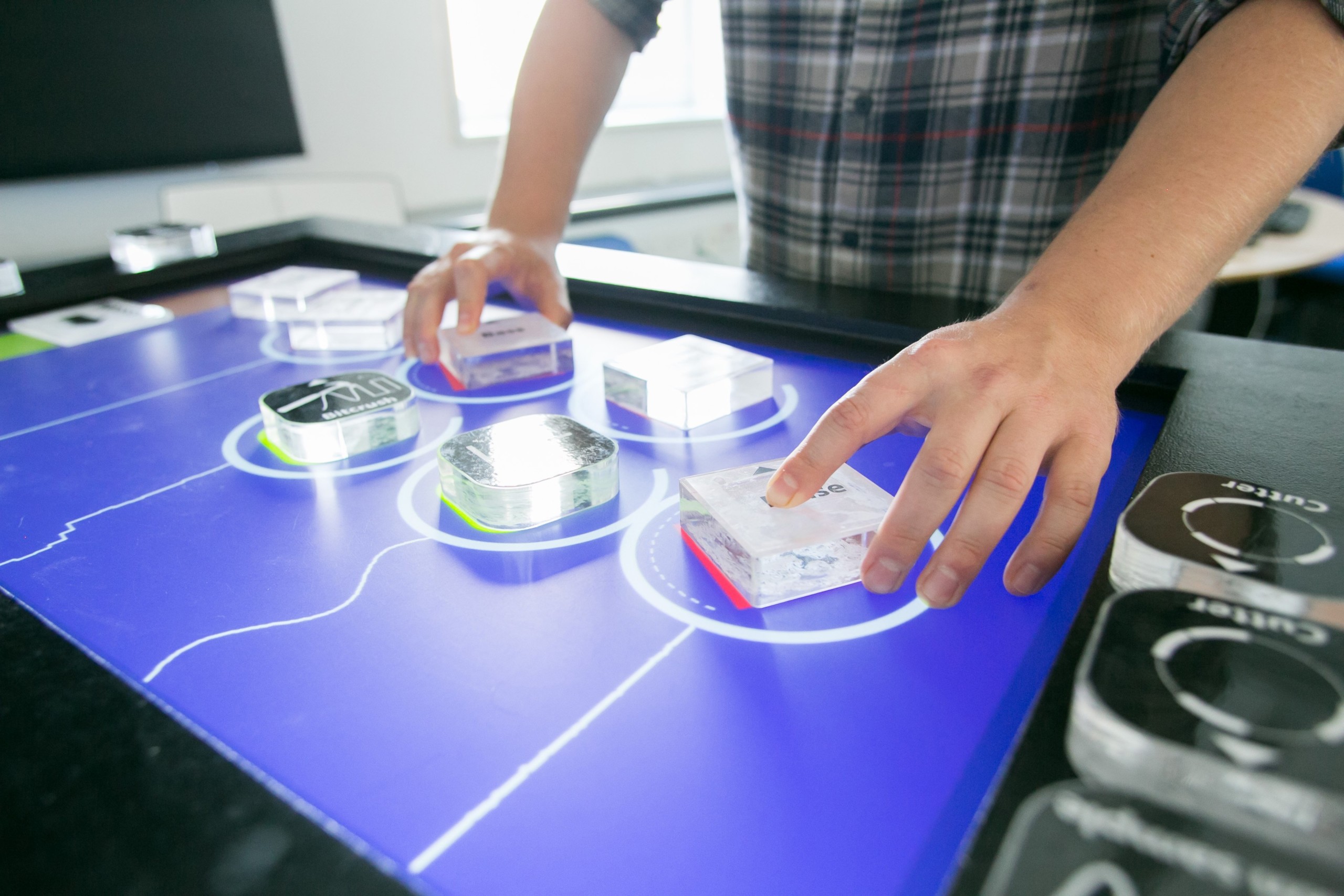 A close-up photo of the so-called MixiTUI - a tangible user interface - mostly used for playing music by operating the bricks. An example of a computer science discipline not very closely associated with mathematics