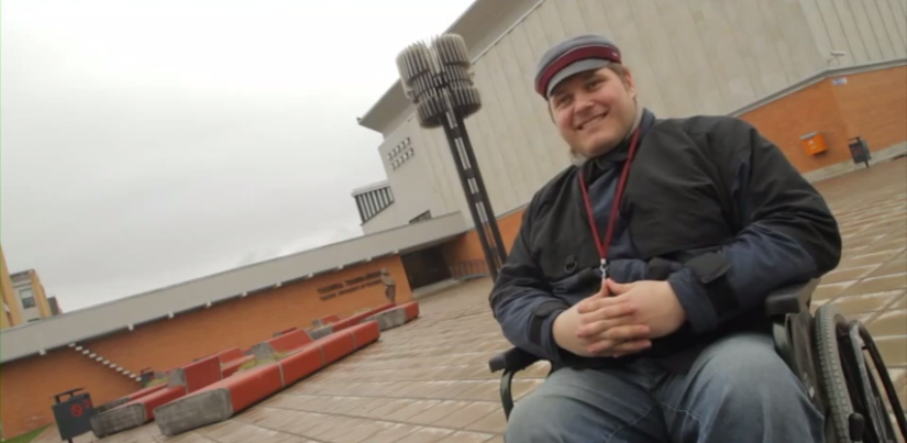 Estonian student Sven Kõllamets, poses in front of his university in Tallín in a promotional video for ExchangeAbility. 