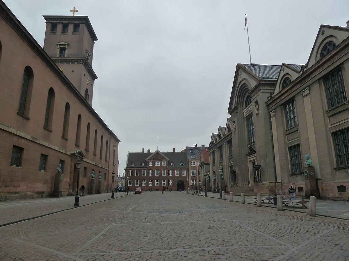 Frue Plads. The university's new main building to the right, and the Church of Our Lady to the left.