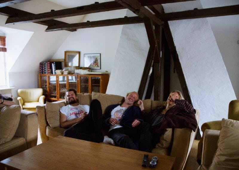 The loft on the top floor, with sofas and and tv. 