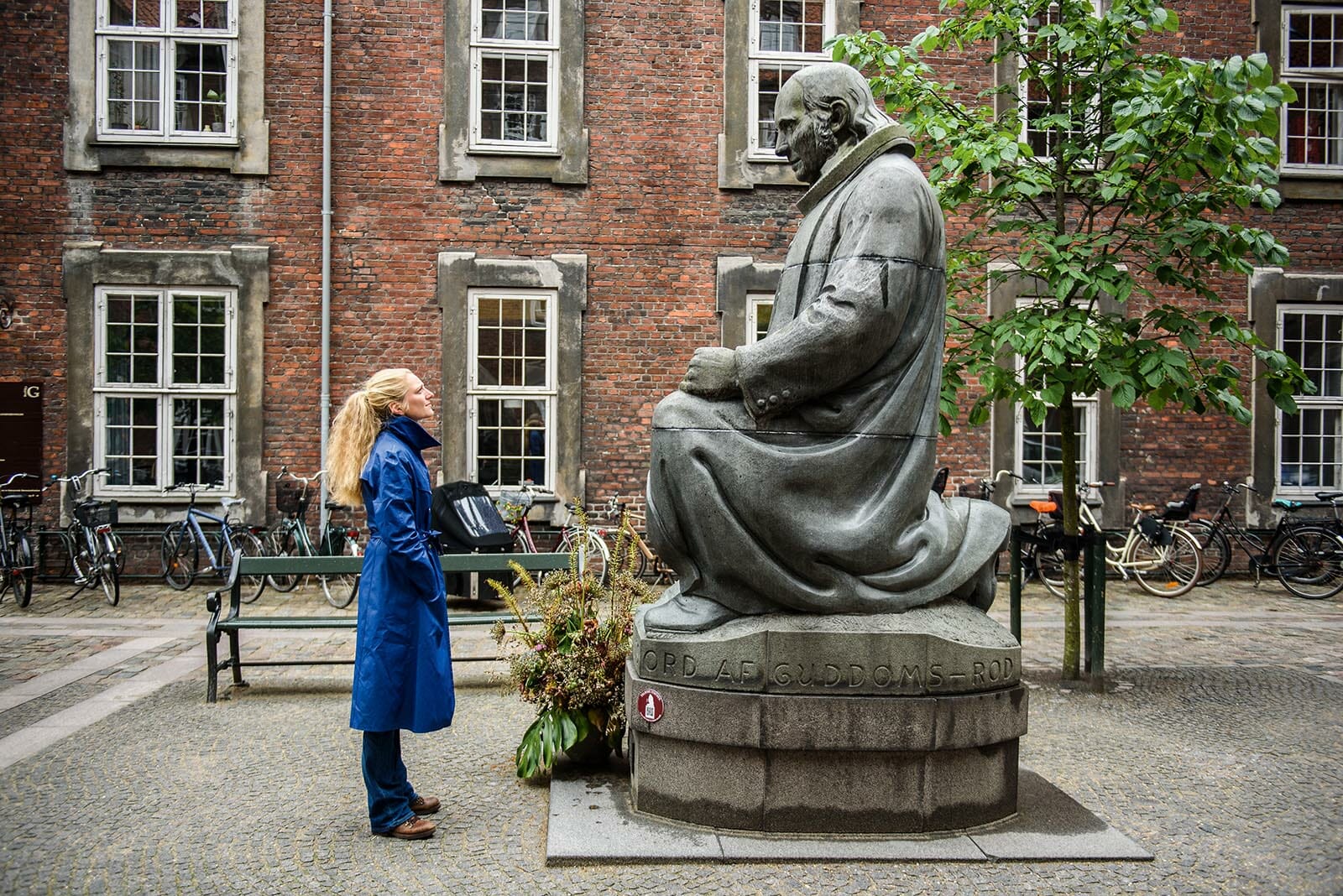 Still inspired by Grundtvig's values. Here MP Zenia Stampe (R) immersed in conversation with the giant.