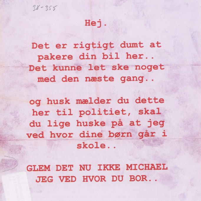 Trusselsbrev skrevet til en bilist, der parkerede på afsenderens faste p-plads.