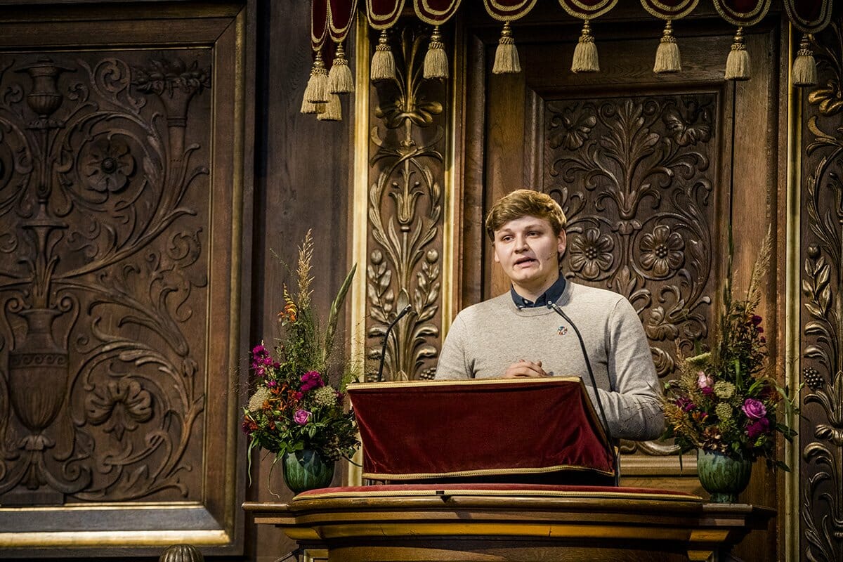 Mike Gudbergsen på Københavns Universitets talerstol 8. november 2019.