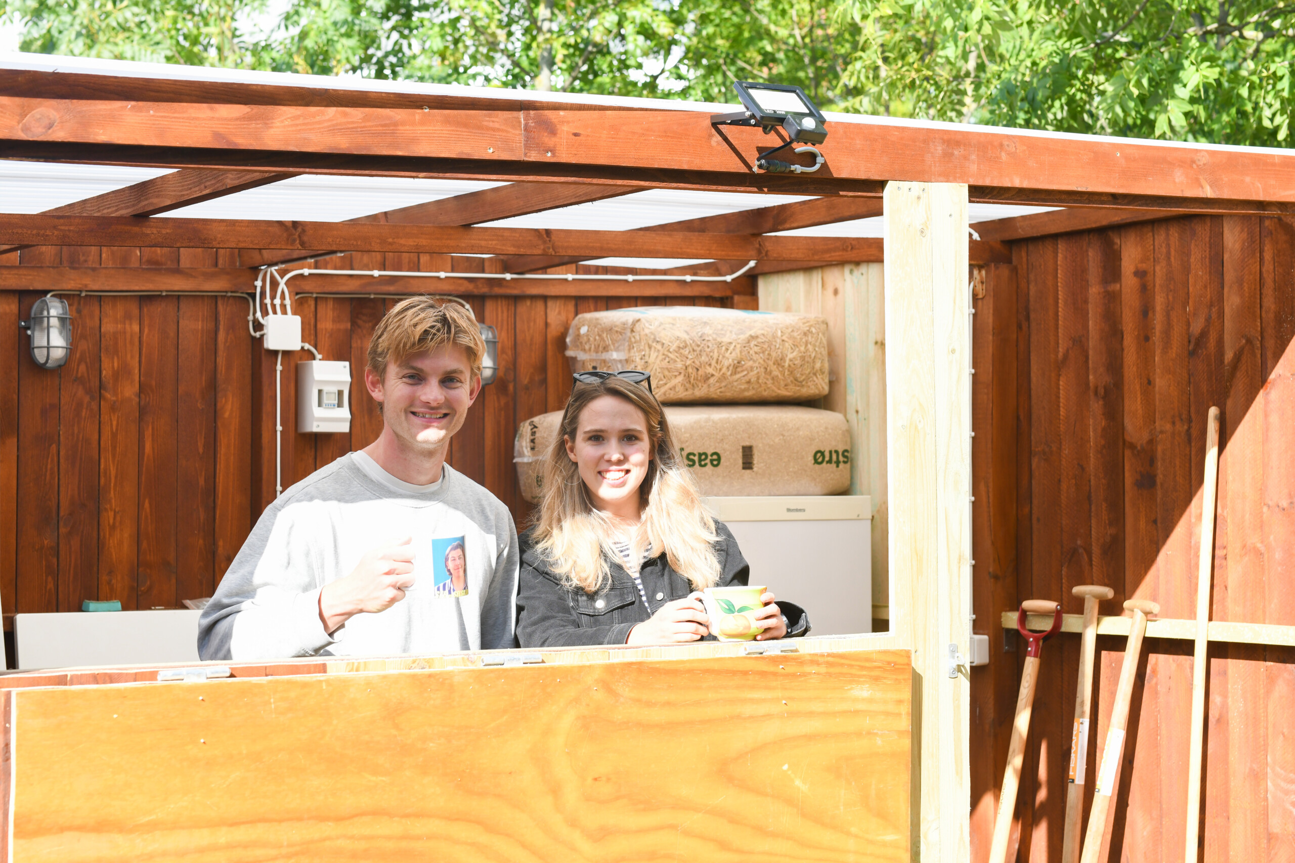 Residents Christian Persson and Emilie Zeuthen in the chicken coop bar.