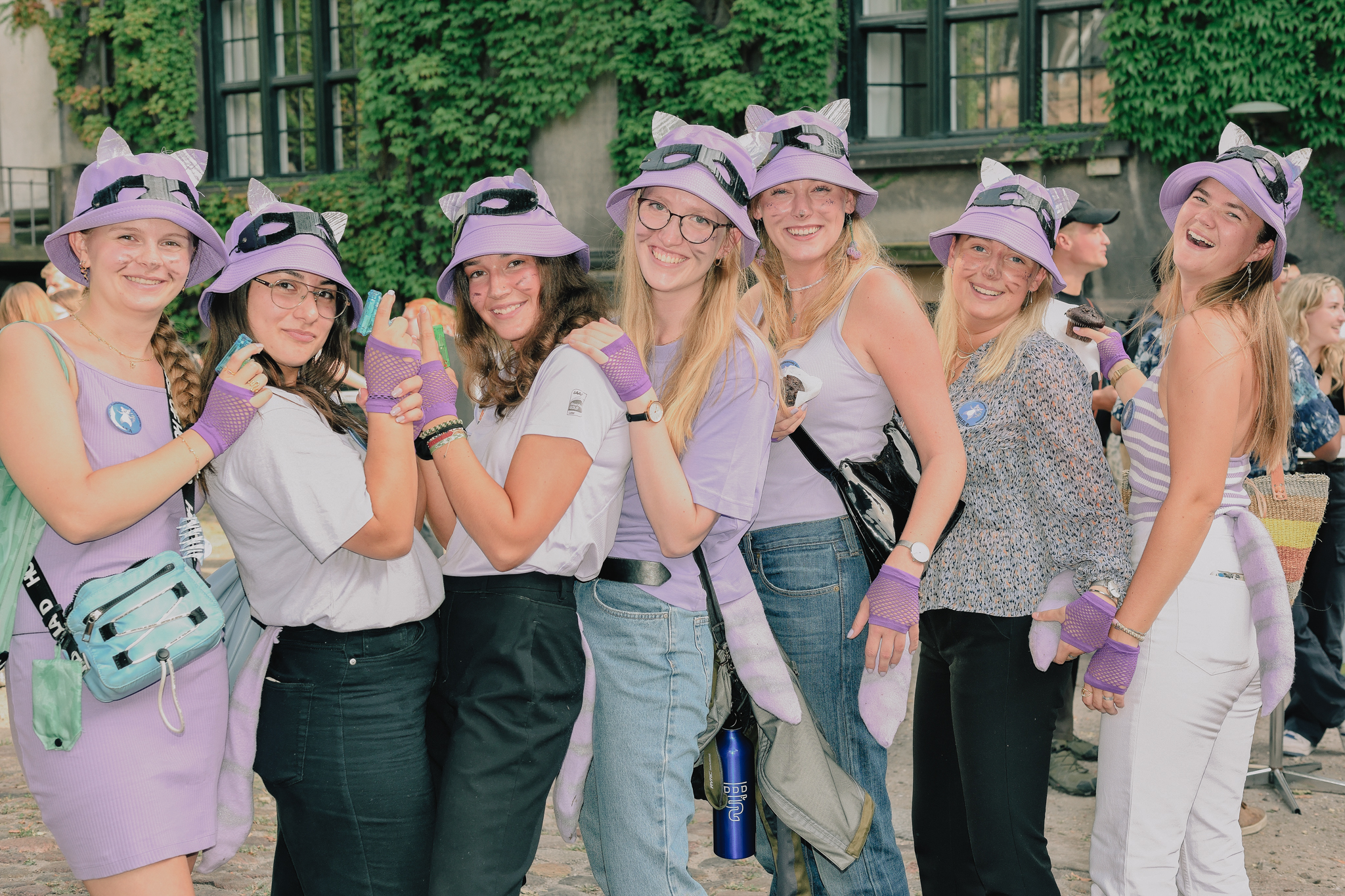 New students of veterinary medicine were tricked into wearing purple cat uniforms. New students of veterinary medicine were tricked into wearing purple cat uniforms. 