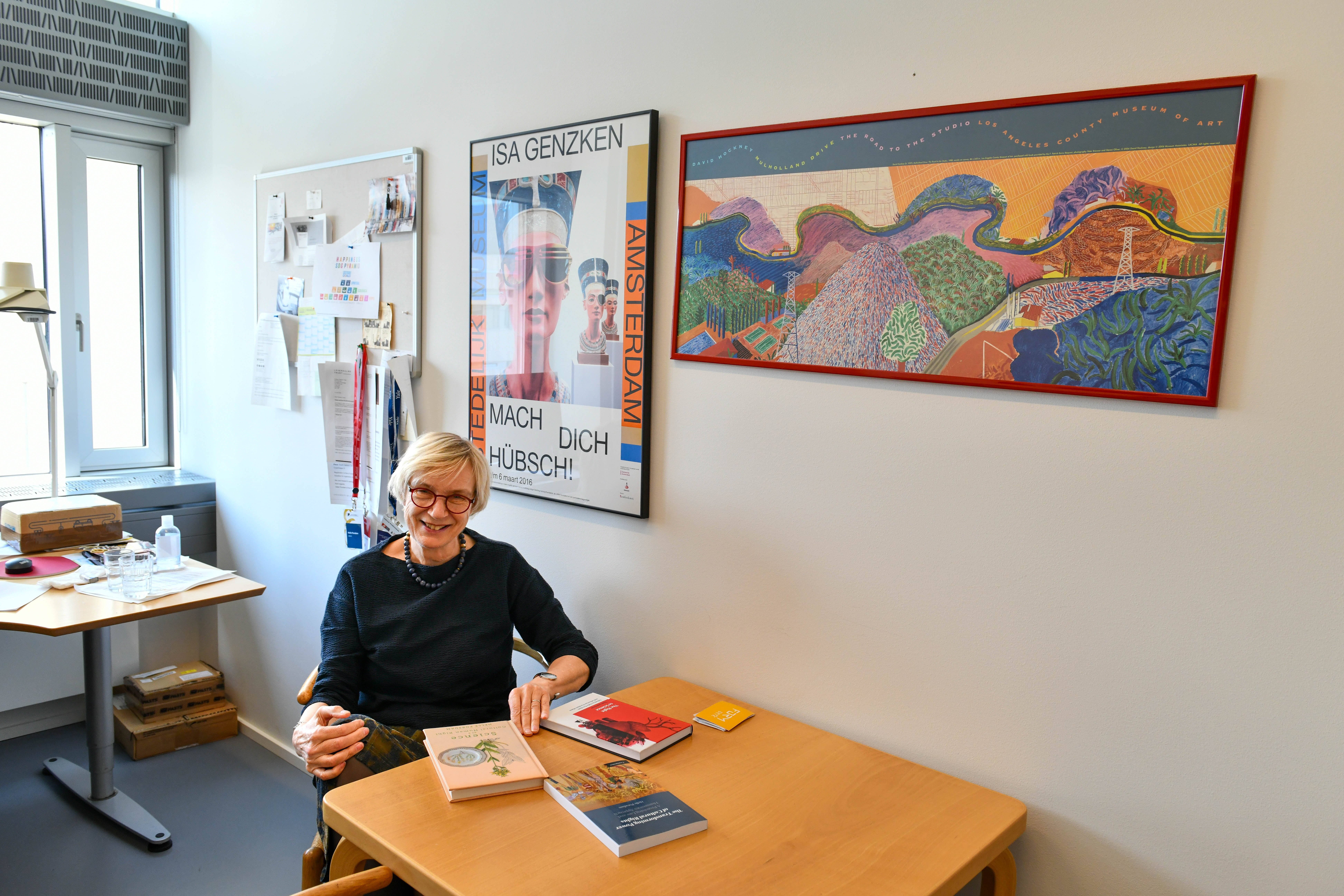 One wall in Helle Porsdam's office is adorned with art. On the other wall there is a poster with Niels Bohr.
